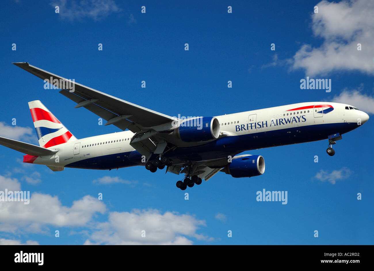 British Airways jet landing with blue sky and clouds Stock Photo Alamy