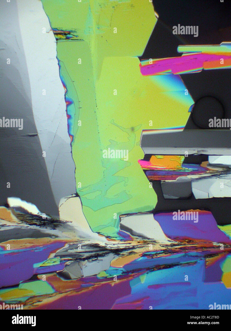 Photomicrograph of Citric acid crystals under crossed polarized light Stock Photo