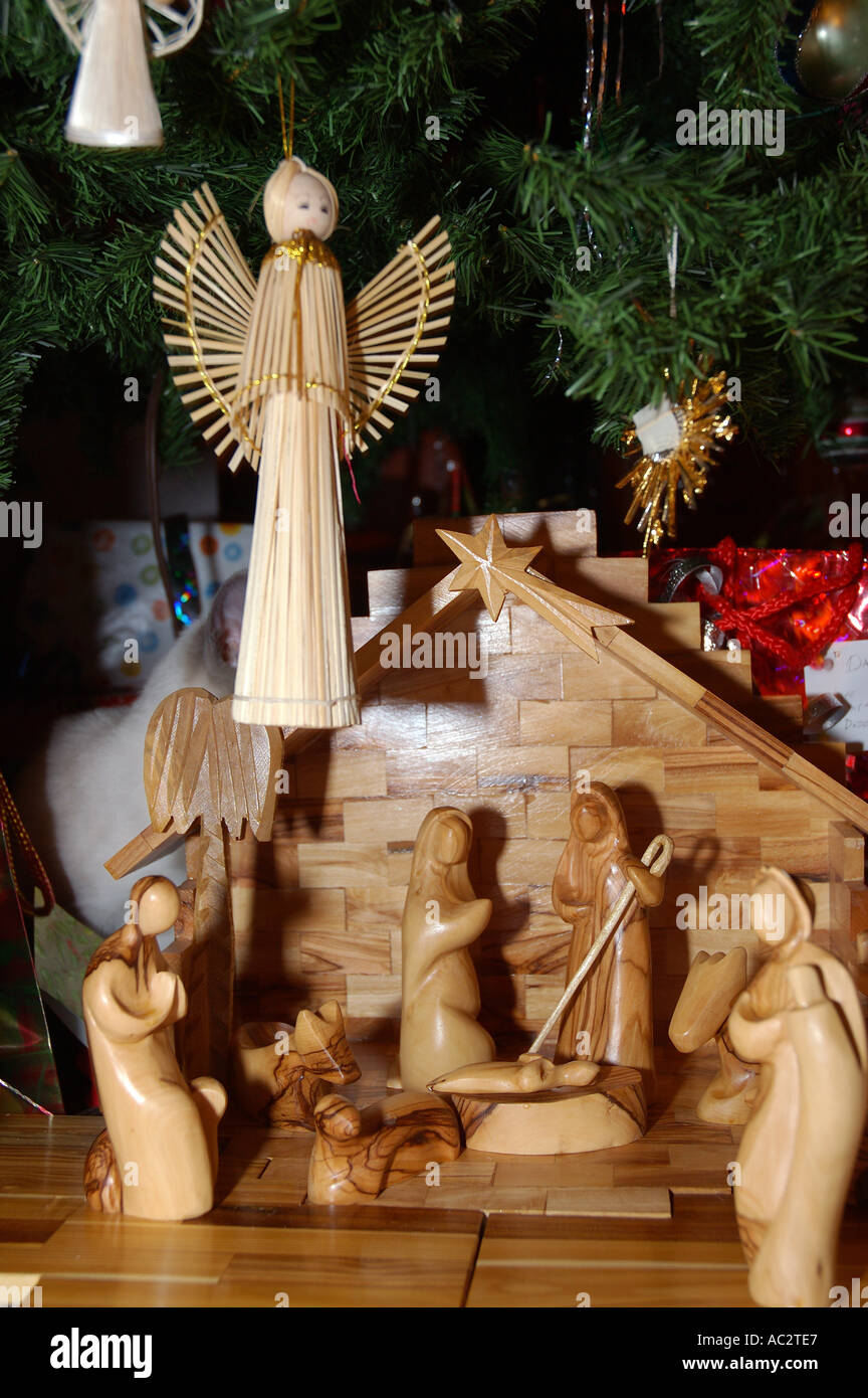 Creche nativity scene under the Christmas tree Stock Photo