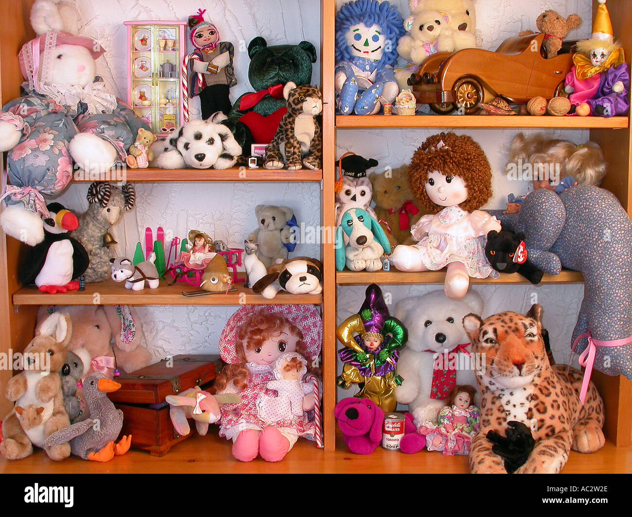 Collection of girls Dolls crowded on a shelf Stock Photo Alamy