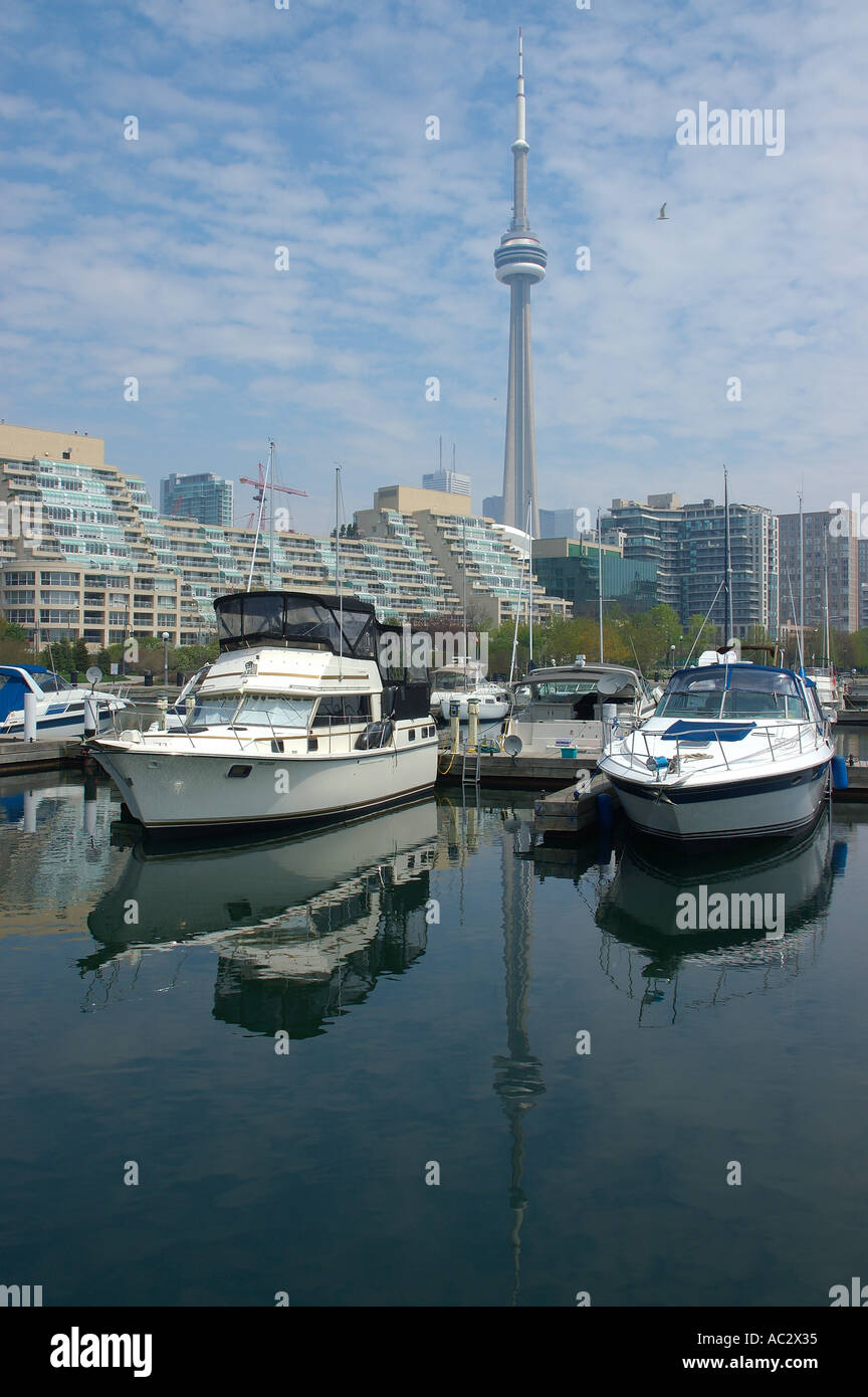Toronto harbourfront with boats in marina and CN tower on a hot hazy day Stock Photo
