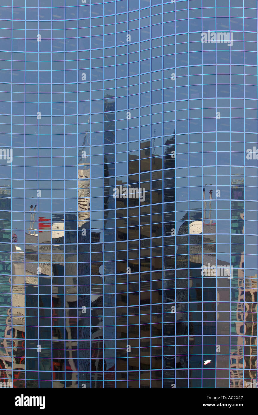 City scape reflections on glass highrise look like a bar chart portrait Stock Photo