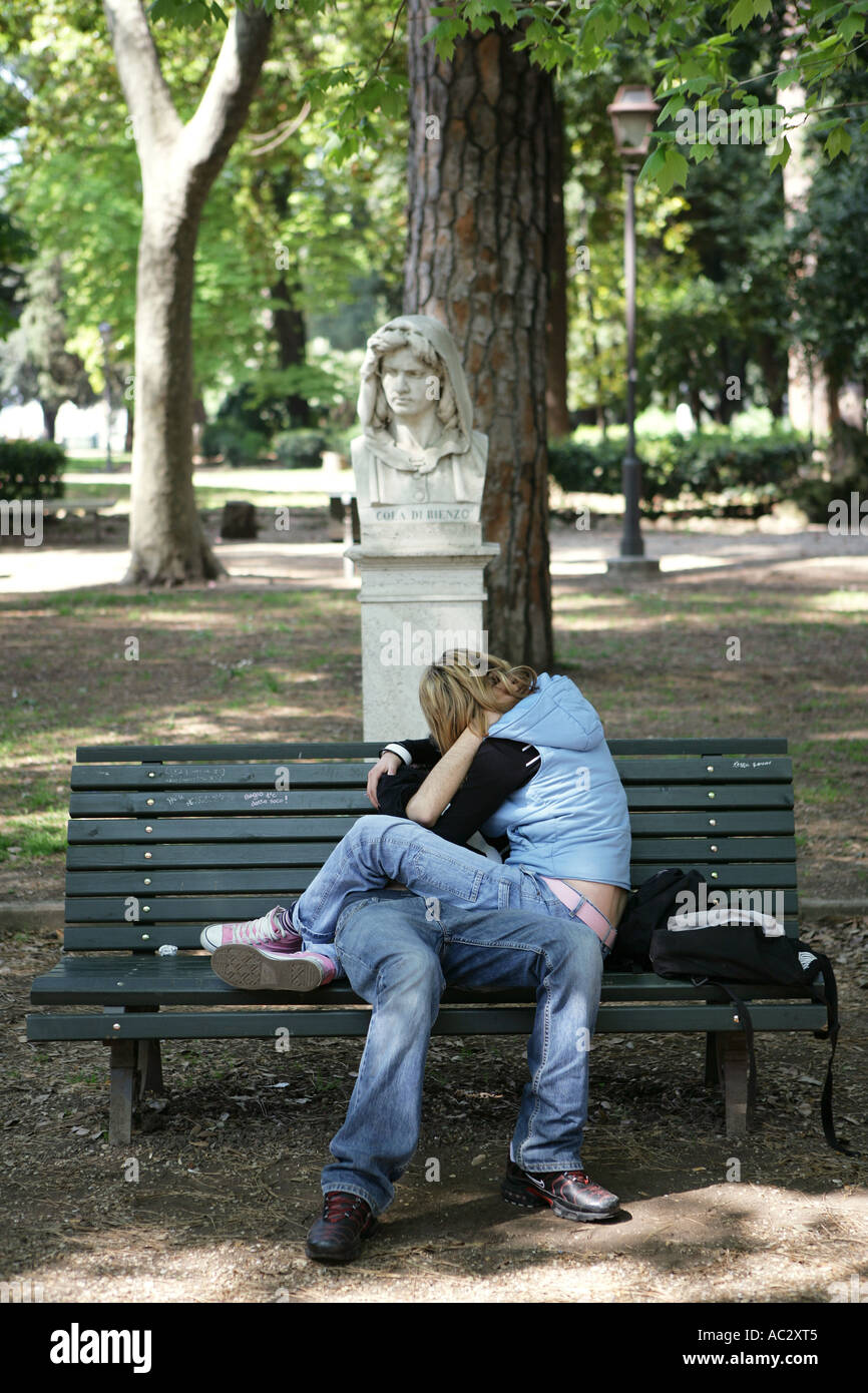 ITA, Italy, Rome : Lovers on a park bench in the park of Villa Borghese ...