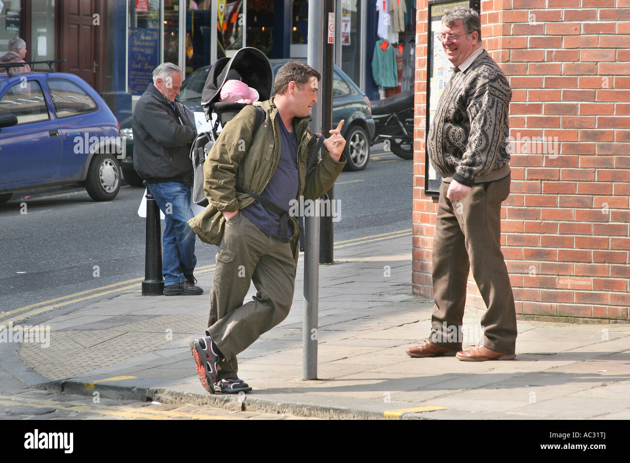man in baby carrier