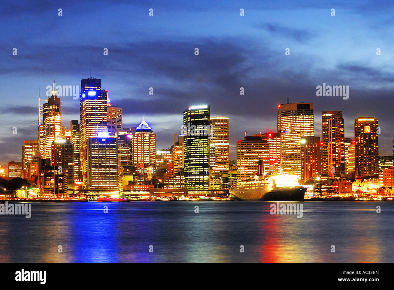 skyline of Sydney with Opera and cruise liner Queen Mary 2, Australia, New South Wales, Sydney Stock Photo