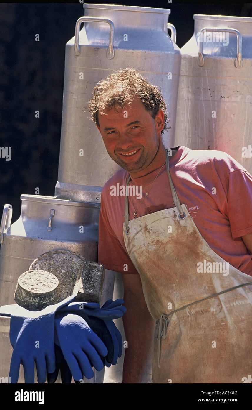 cheesemaker with traditional cheeses from the Alps, France, Savoie Alps Stock Photo