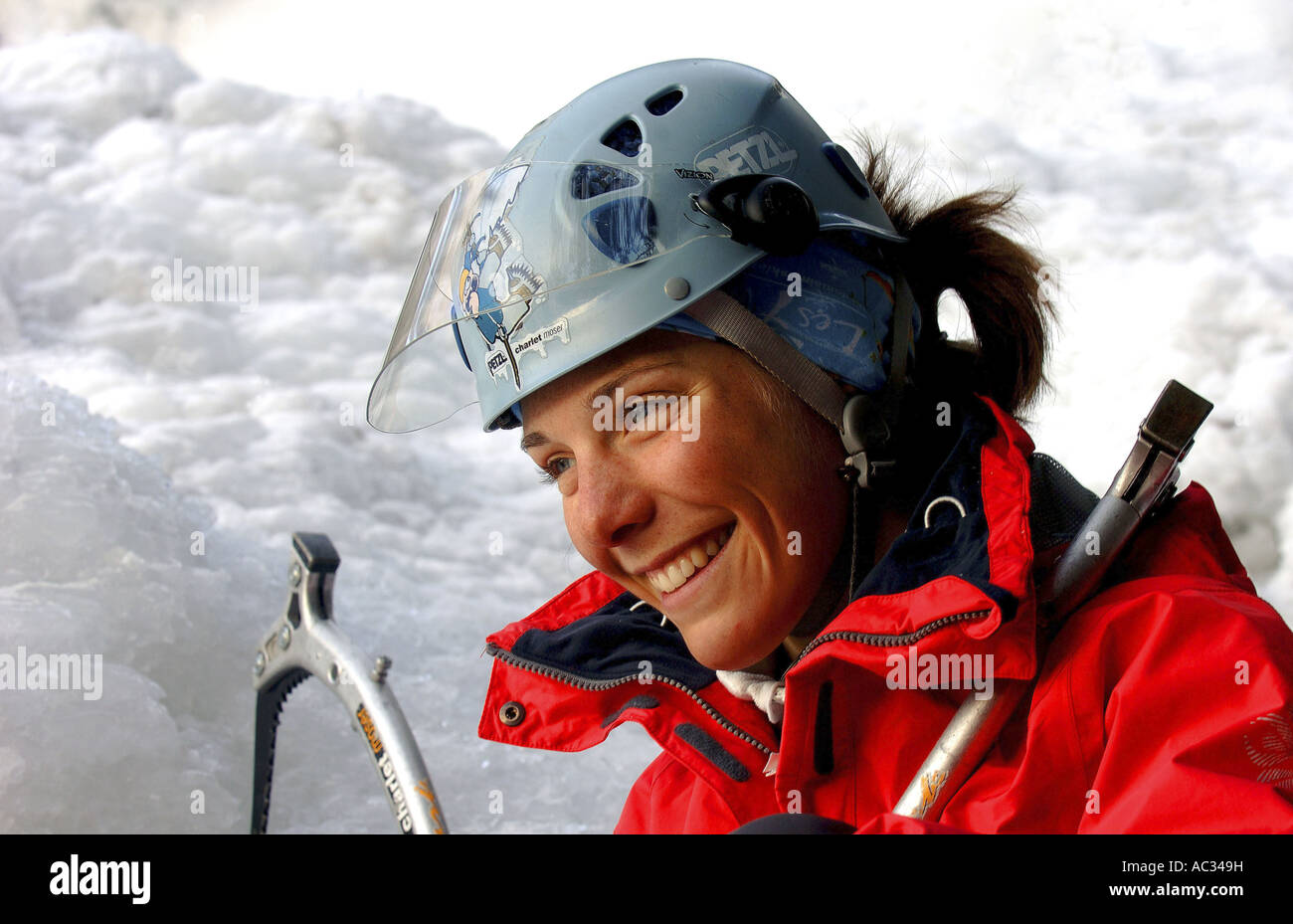 young woman ready for ice climbing, France, Alps Stock Photo Alamy