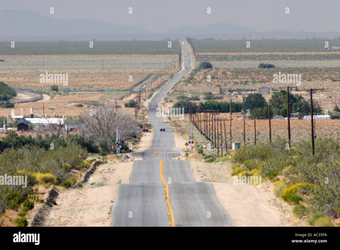Looking south on Neuralia Road off of Highway 14 in Kern County California United States of America Stock Photo