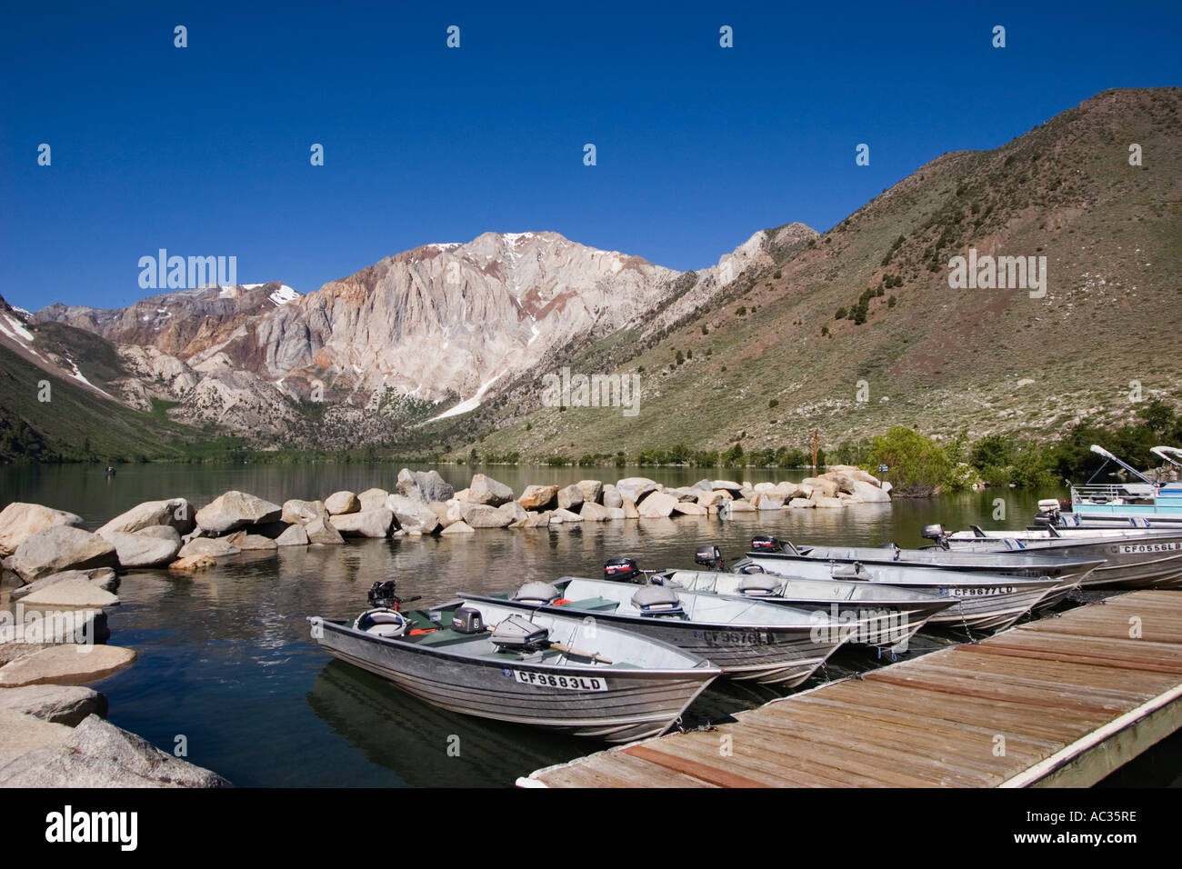 Aluminum motor boats docked at the Convict Lake marina Inyo National Forest California Stock Photo