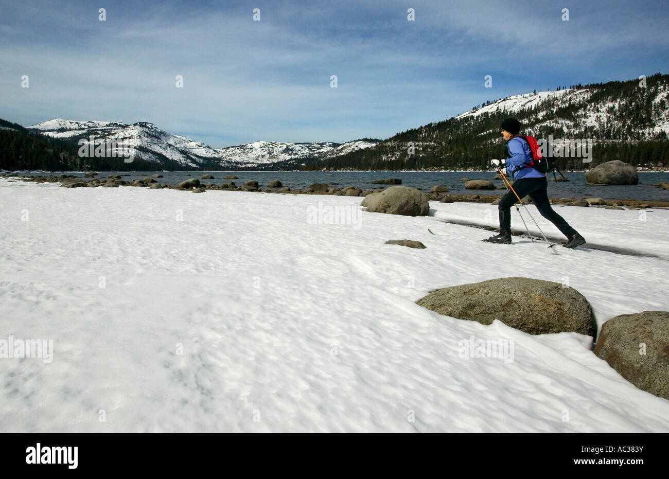 Cross country skier on the shore of Donner Lake, Truckee Califoria