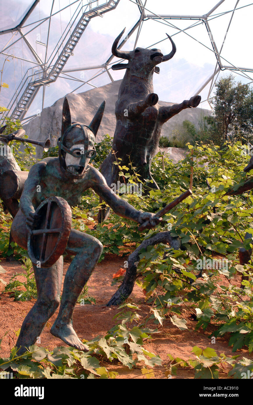 Statues inside a Biome at The Eden Project St Austell Cornwall England Stock Photo