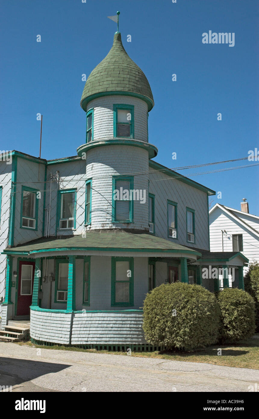 A very unusual house with a russian style dome on a round tower in the