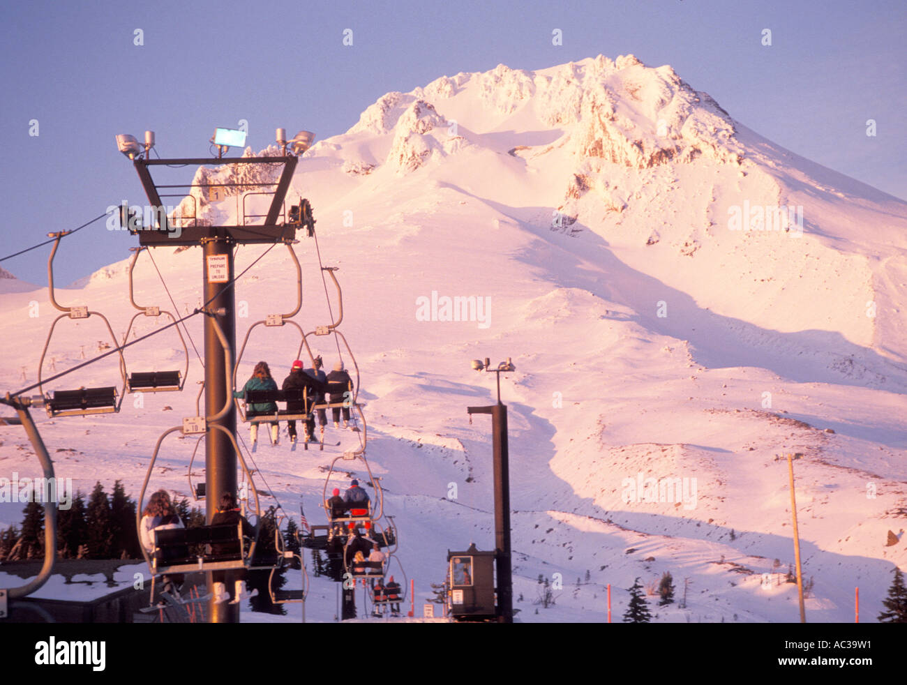 Skiers Riding up the Mountain Stock Photo - Alamy