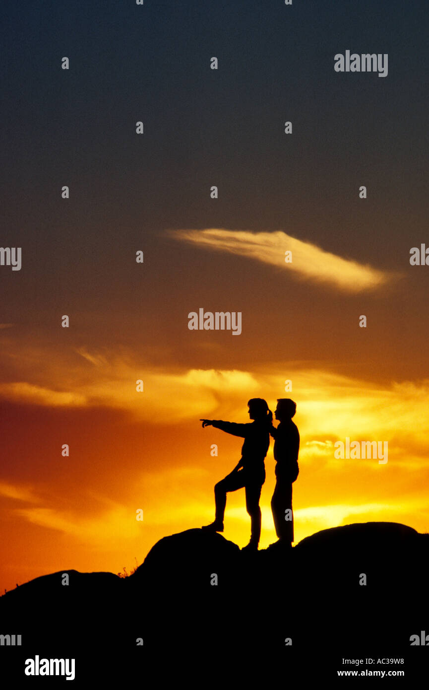 Pointing at the sunset hi-res stock photography and images - Alamy