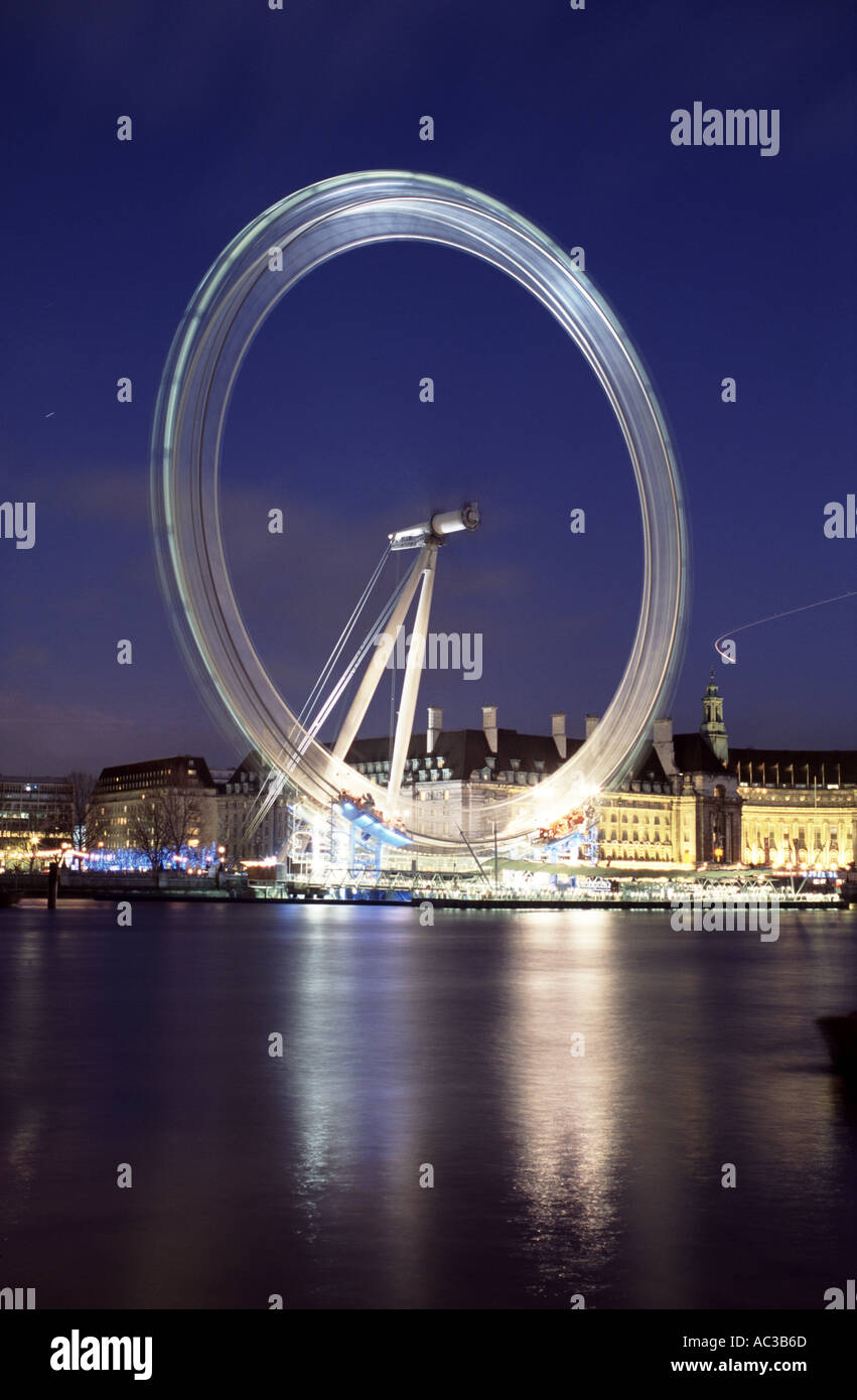 London eye spinning at night Stock Photo