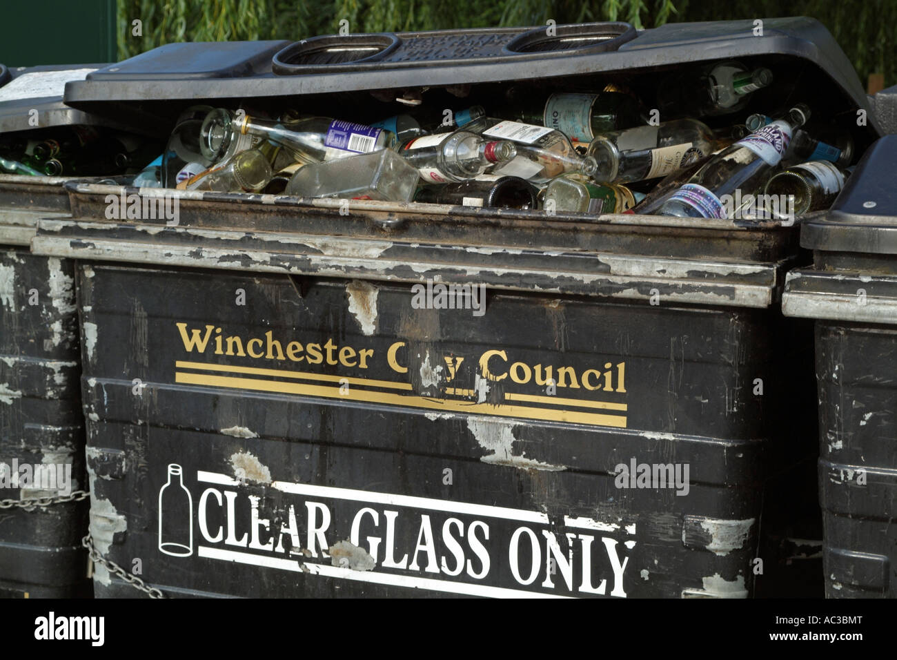 Glass recycling collection point Overfilled bins Stock Photo Alamy