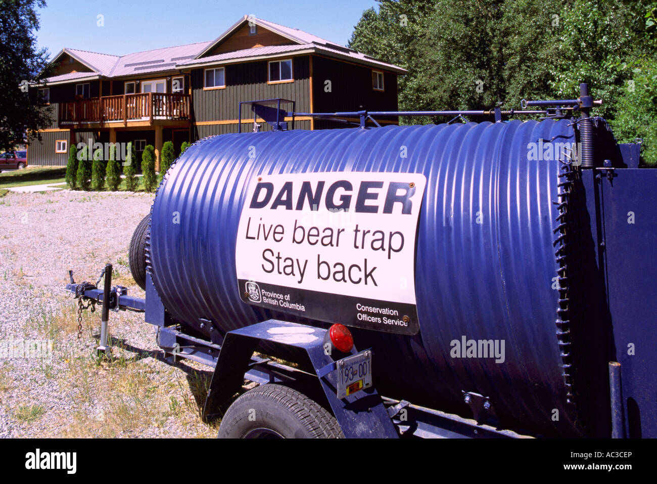 A Live Bear Trap located in front of a House in British Columbia, Canada - Wildlife Conservation and Public Safety Stock Photo