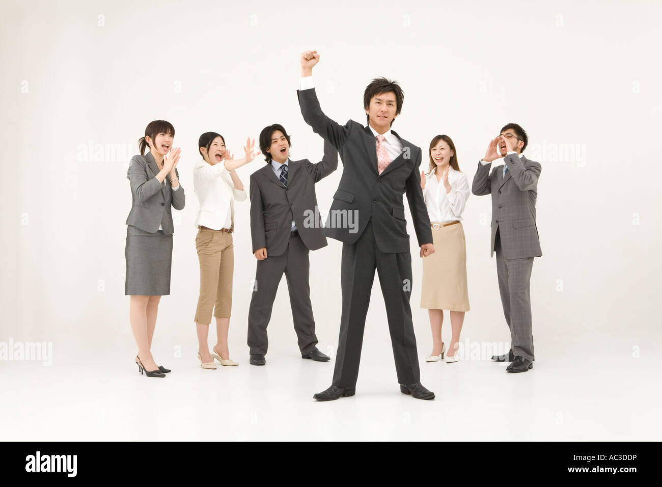 Business people cheering Stock Photo - Alamy
