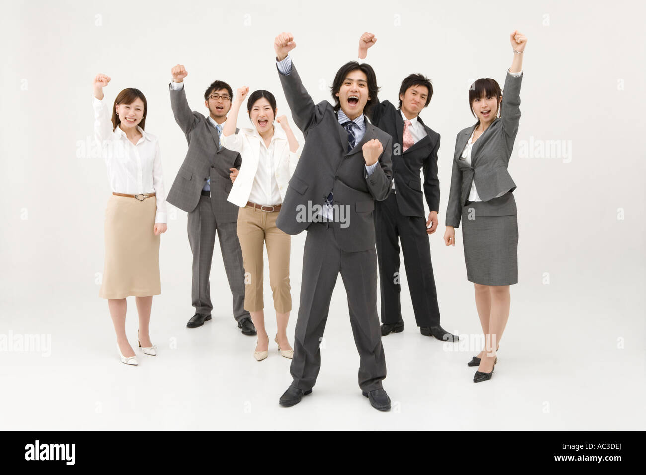 Business people cheering Stock Photo - Alamy