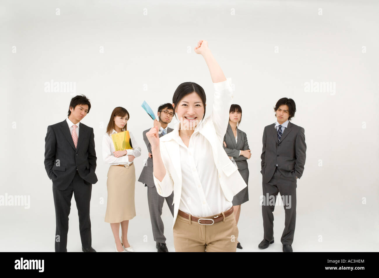 Businesswoman and her colleagues Stock Photo