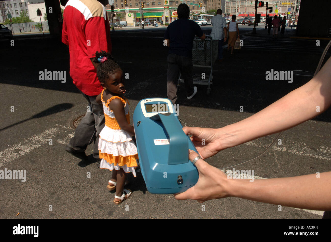 Environmental engineer measures air quality for air pollution in the Bronx in NYC using a