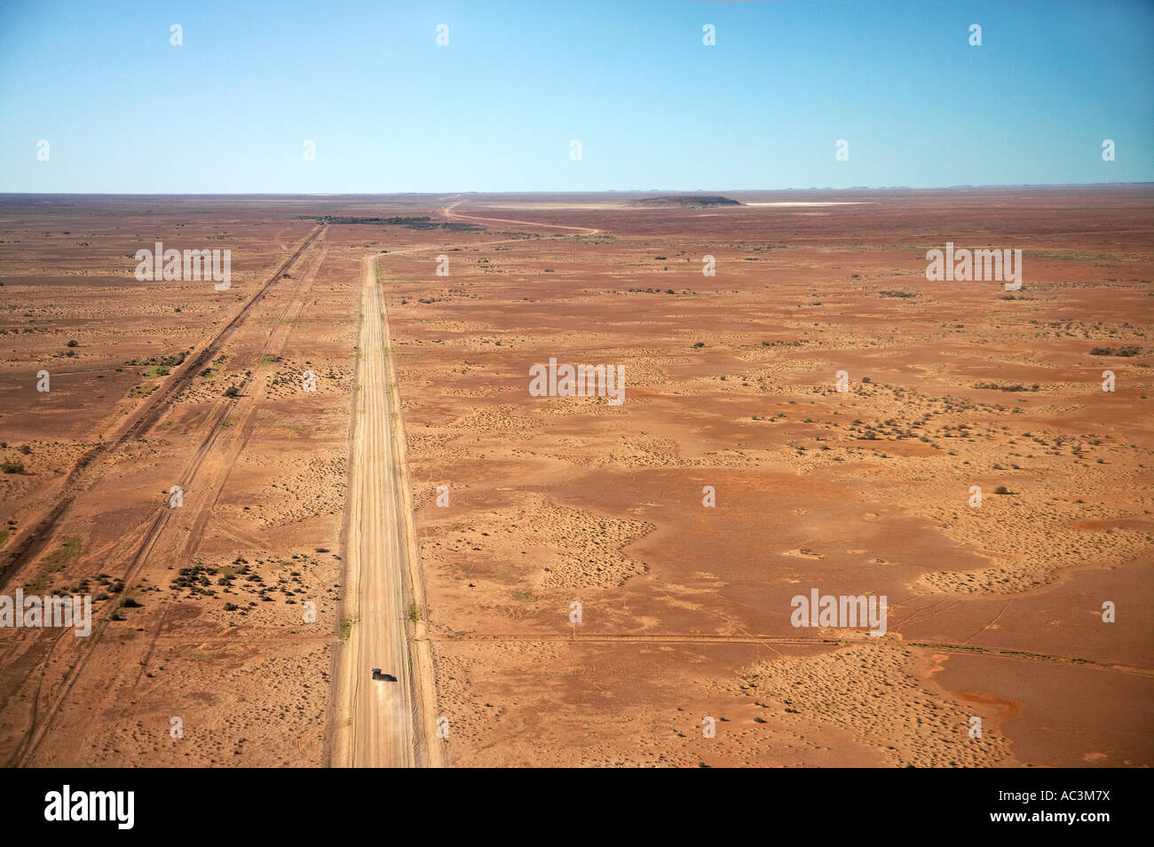 Oodnadatta Track and Old Ghan Train Line near William Creek Outback South Australia Australia aerial Stock Photo