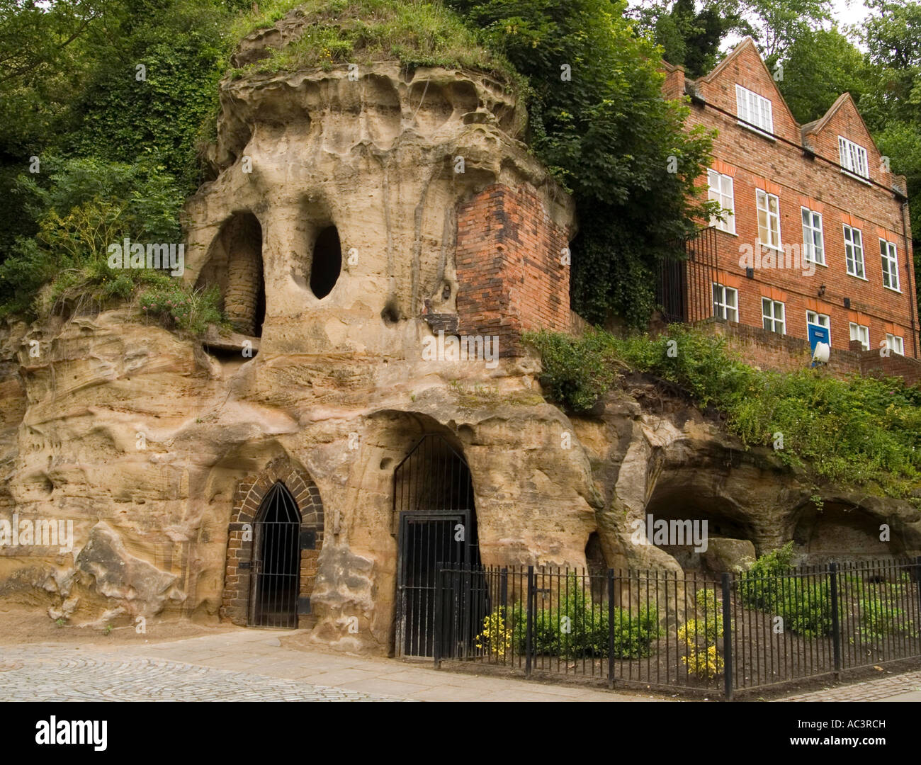 The entrance to Mortimers Hole cave at the foot of Nottingham Castle, next to the Brewhouse Yard Museum of Nottingham Life, UK Stock Photo