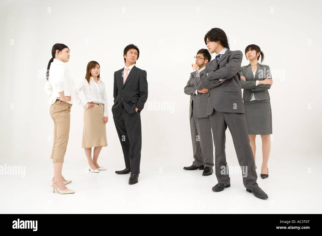 Business people glaring at each other Stock Photo