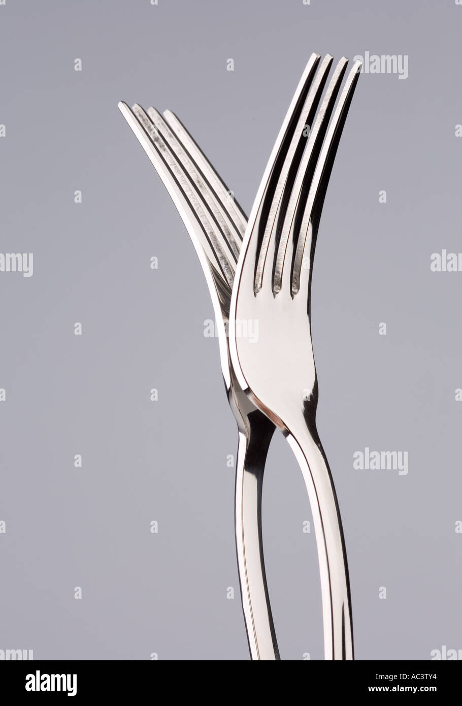 two forks joined Stock Photo