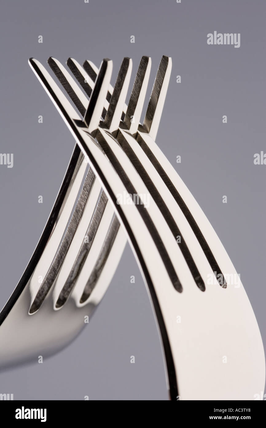 two forks joined Stock Photo