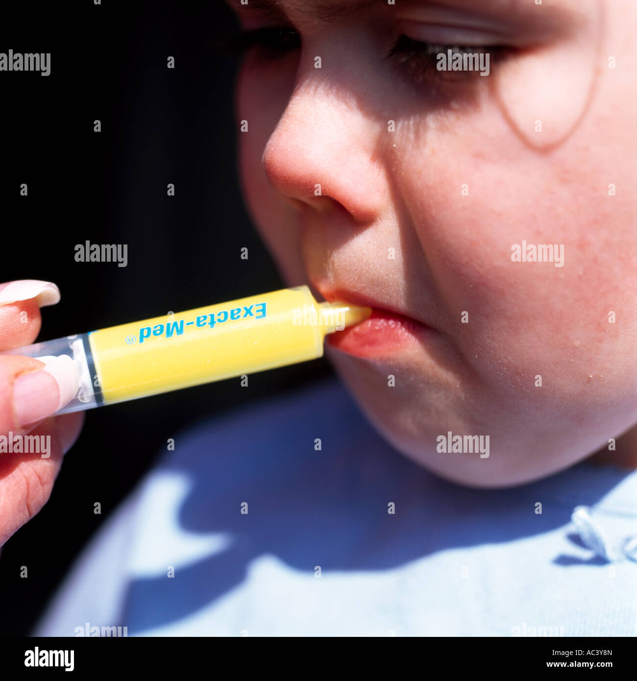 Child Taking Medicine Stock Photo Alamy