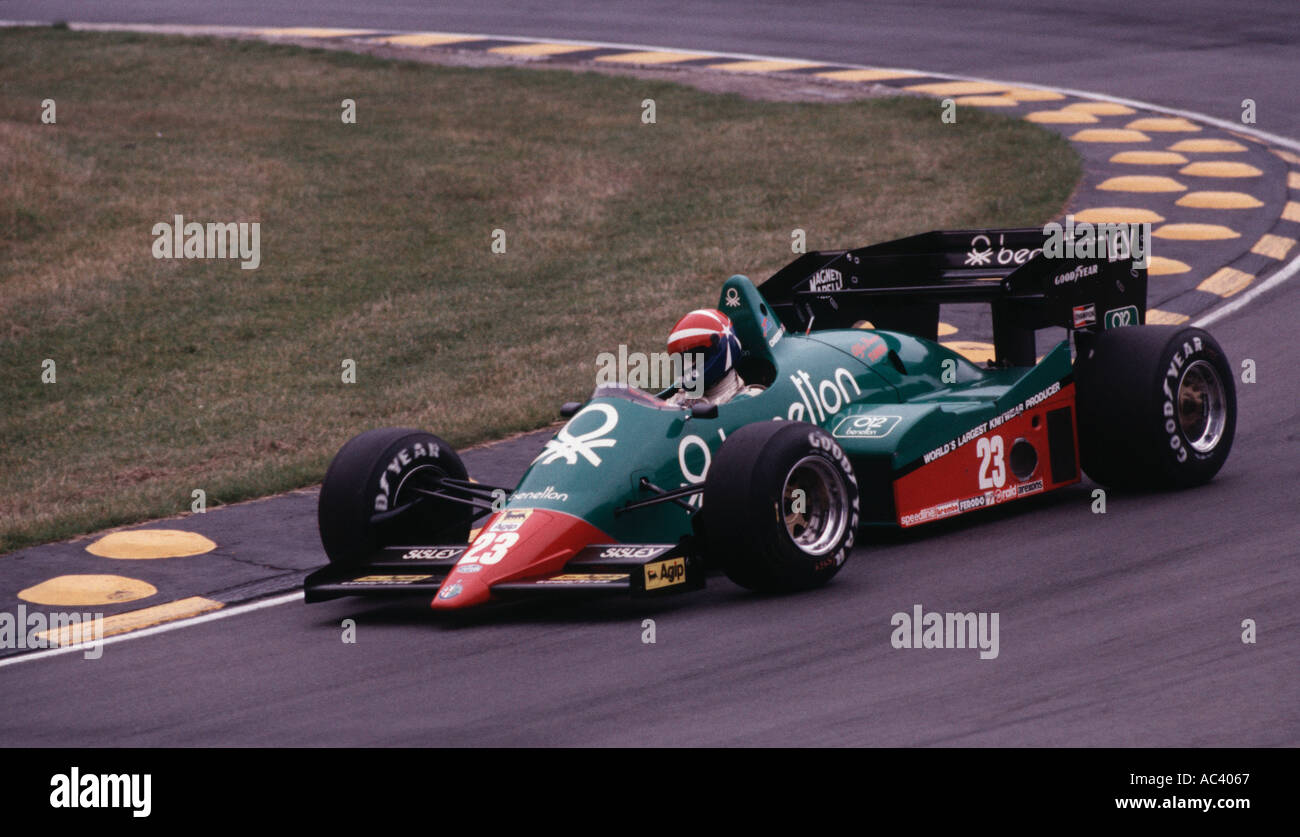 American driver Eddie Cheever in a Benetton sponsored Alfa Romeo 185  formula 1 race car at Brands Hatch circuit in England 1985 Stock Photo -  Alamy