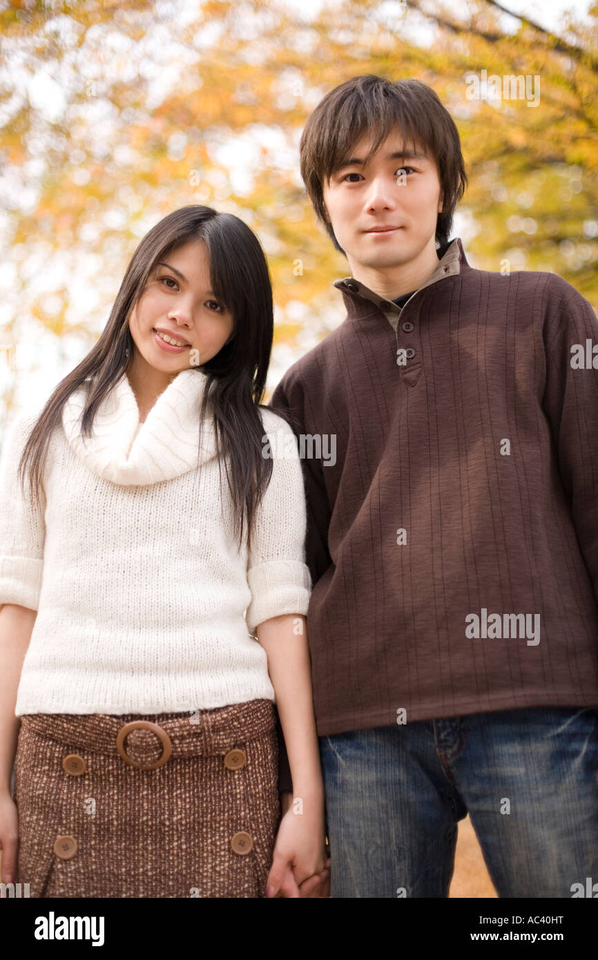 Young couple looking at camera Stock Photo - Alamy