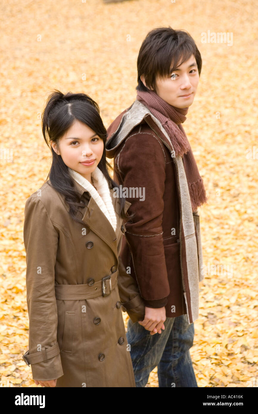 Young asian men holding hands hi-res stock photography and images - Alamy
