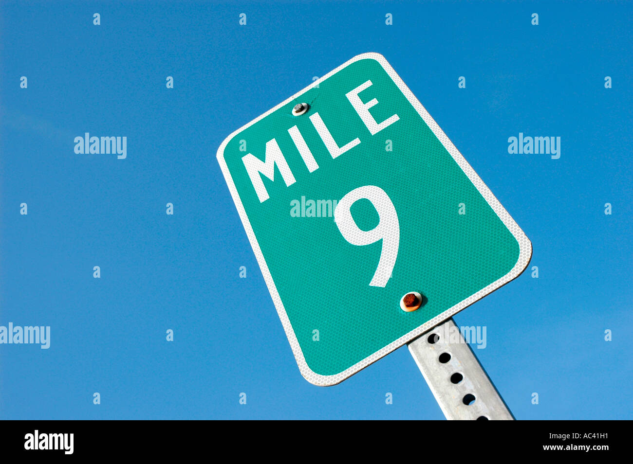 9 nine mile distance marker sign on freeway highway position Stock