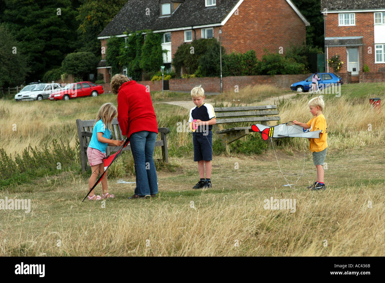 Family flying kites at Brill Hill Oxfordshire Stock Photo Alamy