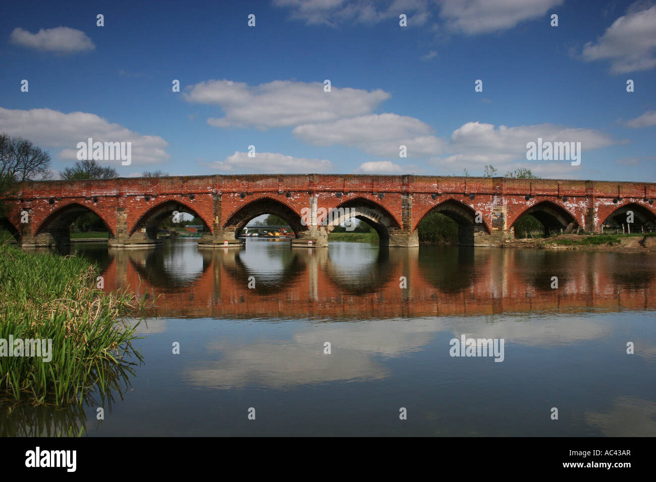 Great Barford bridge spanning River Great Ouse, Bedfordshire. Landscape. Full colour. Stock Photo
