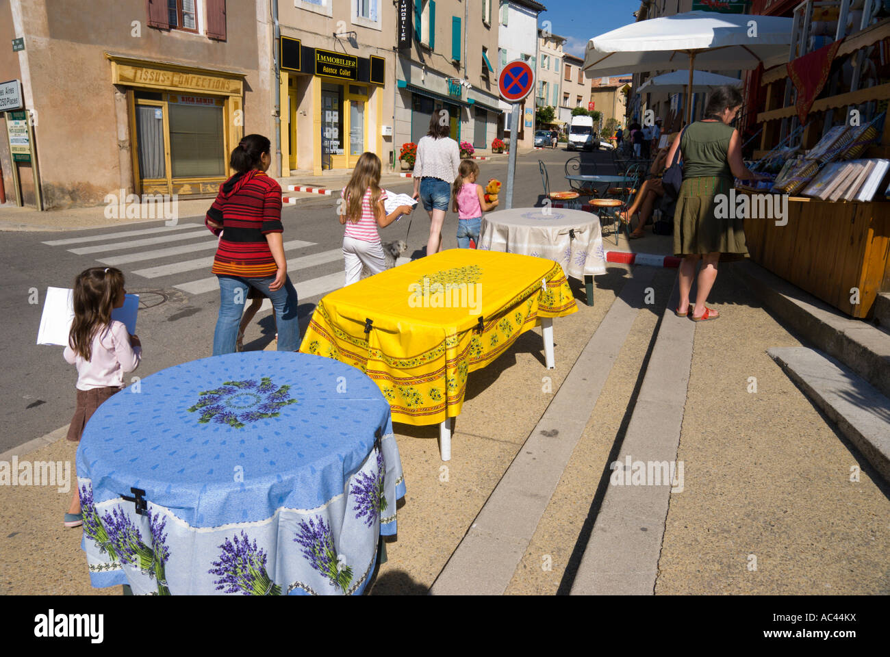 Town centre Sault France Provence Provençal fabric tablecloths for sale Stock Photo