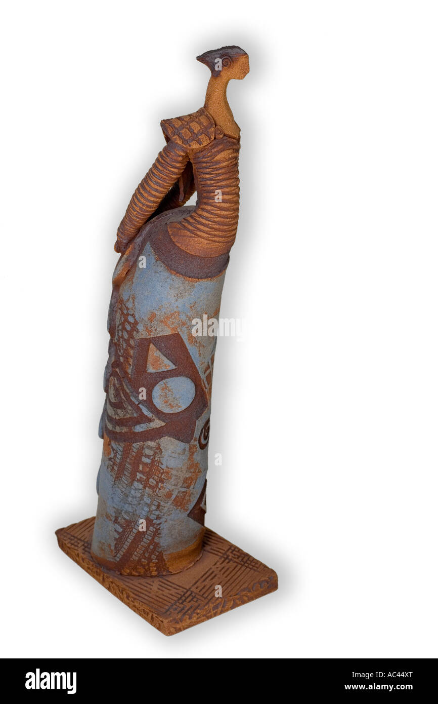 A small terracotta statue representing a stylised woman.Spain. Statuette en terre cuite représentant une femme stylisée. Espagne Stock Photo