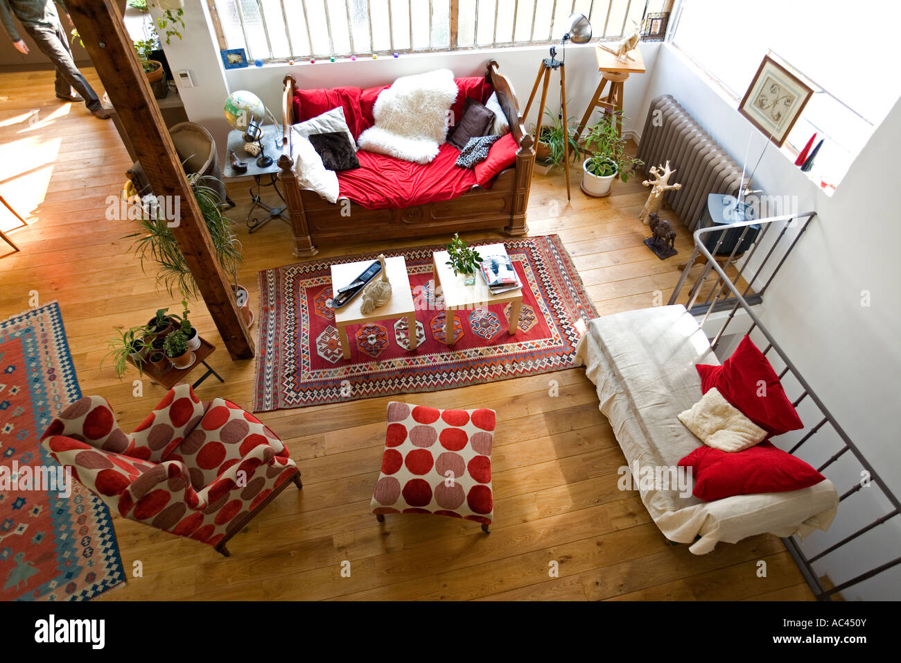 A high angle shot on the living room of a loft (Paris). Vue plongeante sur un salon installé dans un loft parisien (Paris) Stock Photo