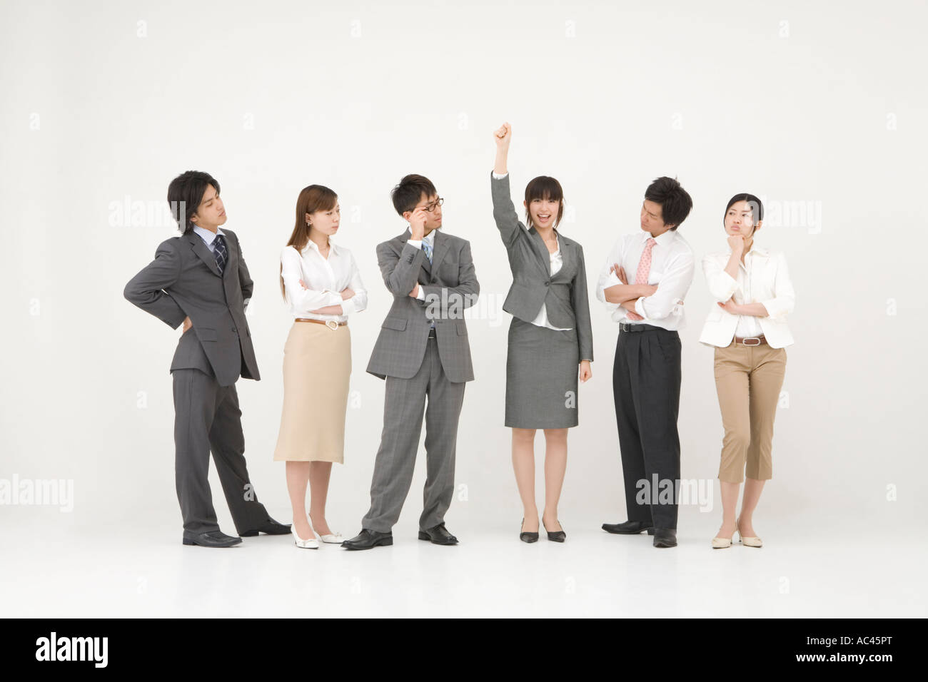 Group out standing woman hi-res stock photography and images - Alamy