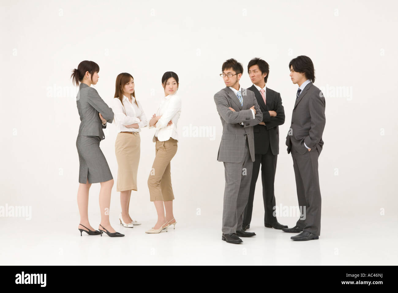 Business people glaring at each other Stock Photo