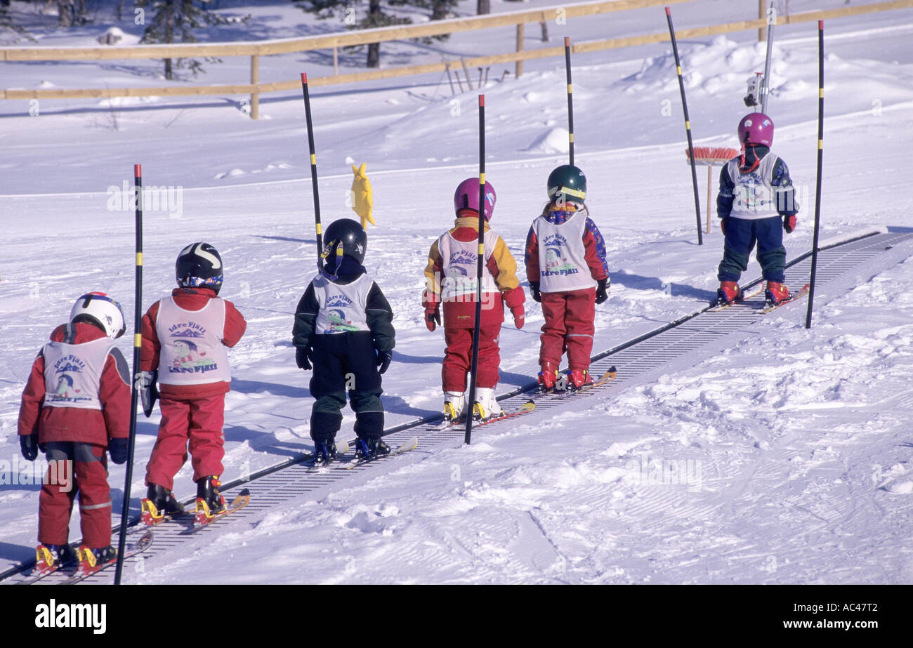 Children Skiers on a moving belt ski lift at Idre Fjäll, Sweden ...