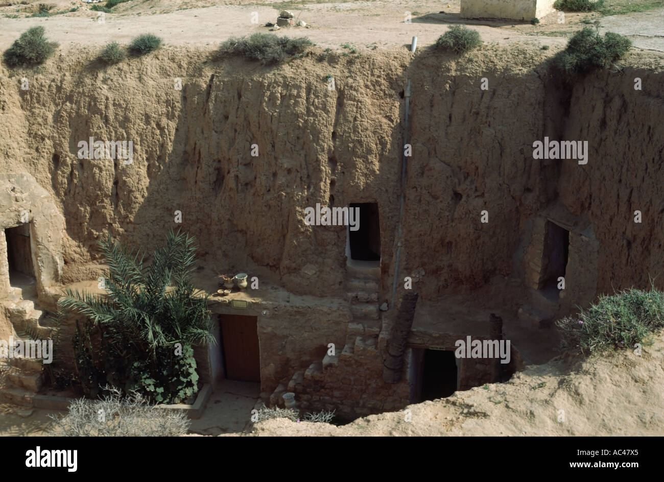View from above of troglodyte cave dwelling in the village of Matmata ...