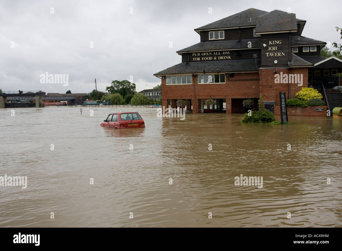 Car submerged in marina car park in flooded River Avon Tewkesbury Gloucestershire UK Stock Photo
