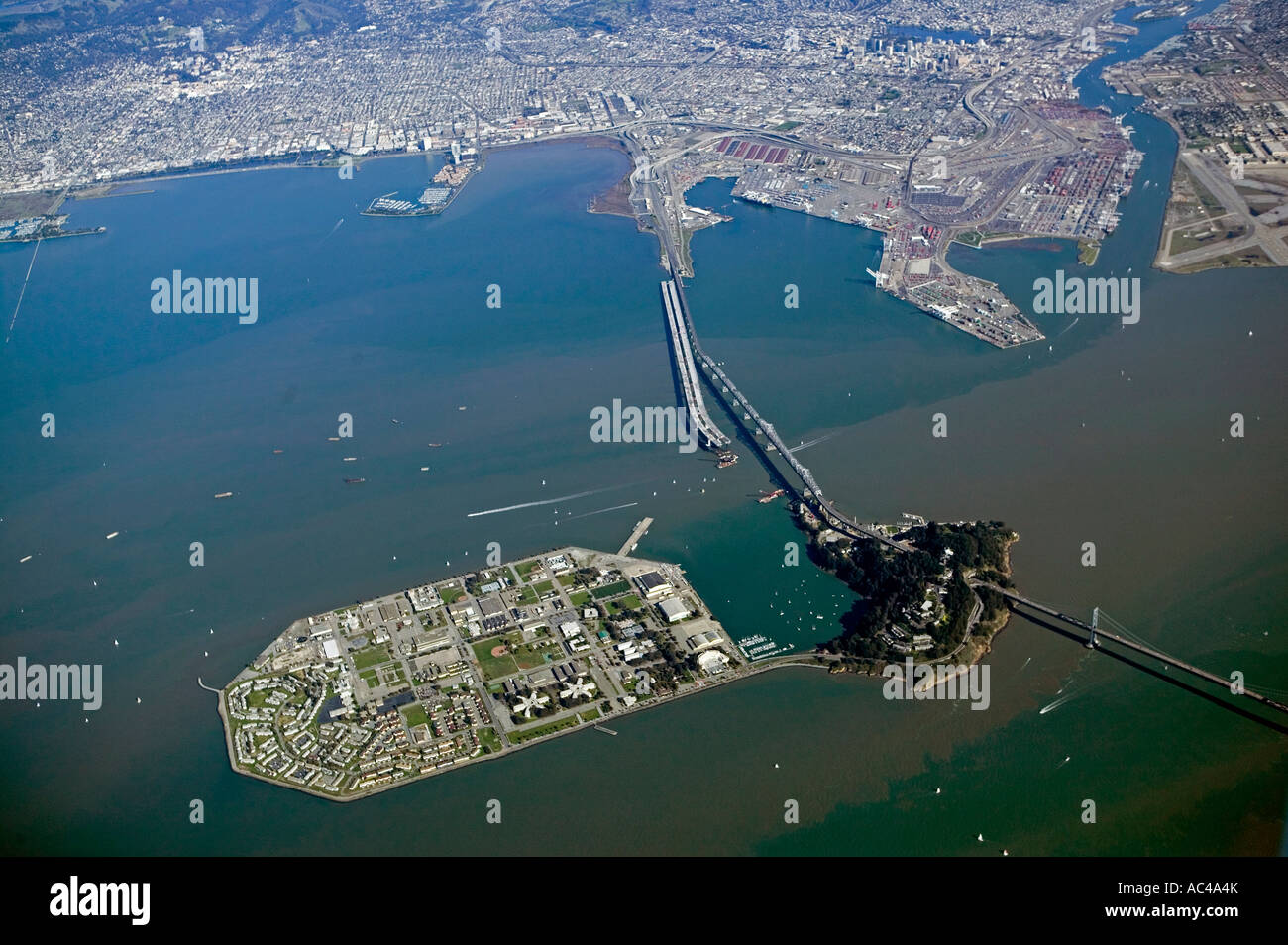 aerial above tidal action at Treasure and Yerba Buena Islands looking toward the Port of Oakland and Emeryville, California Stock Photo
