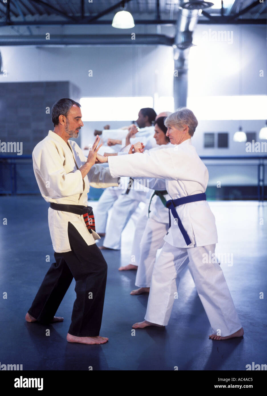 Karate instructor teaching karate class Stock Photo Alamy