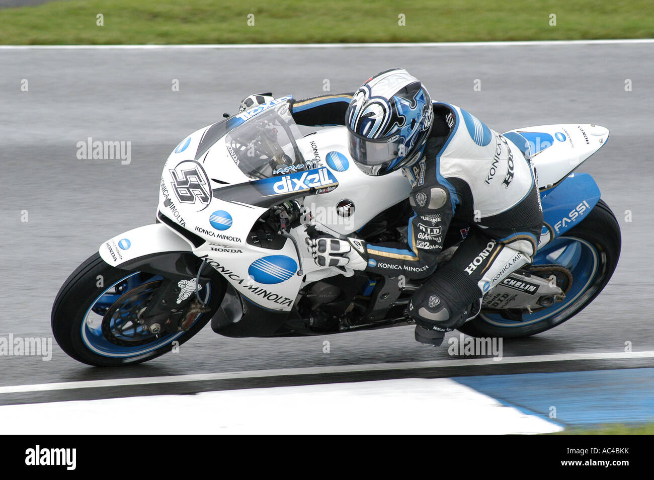 MotoGP rider Shinya Nakano, of Japan, looks over his