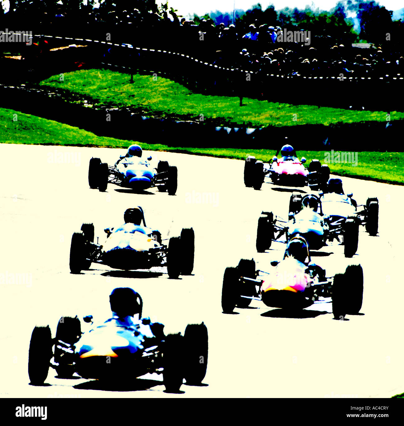 Concept image of classic single seater racers at Goodwood circuit. Stock Photo