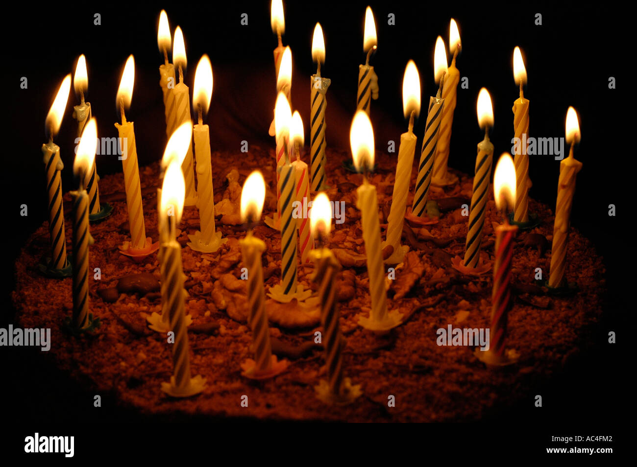 birthday cake with candles in dark Stock Photo - Alamy